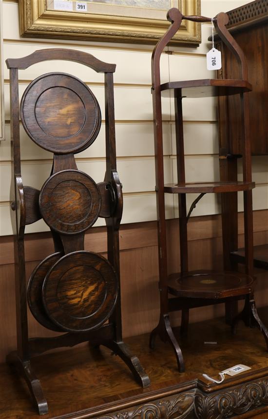 An Edwardian inlaid mahogany cake stand and an oak cake stand